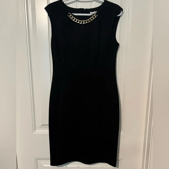 CALVIN KLEIN
Pre-loved Black Dress with Chain Accent💕
Size: 8 - Picture 8 of 10